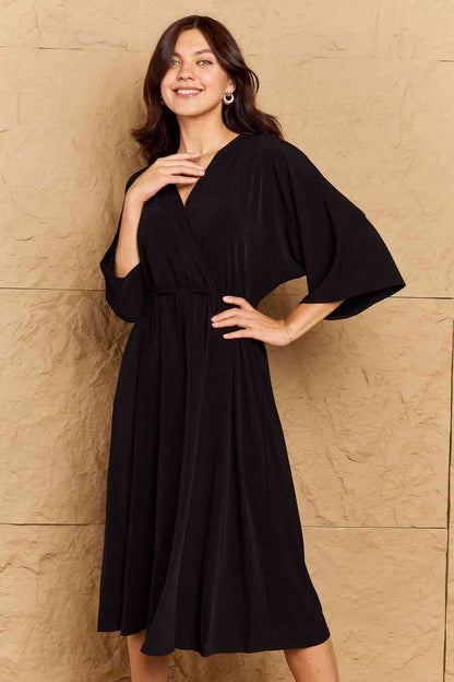 Midi Length Wrap Dress in Black